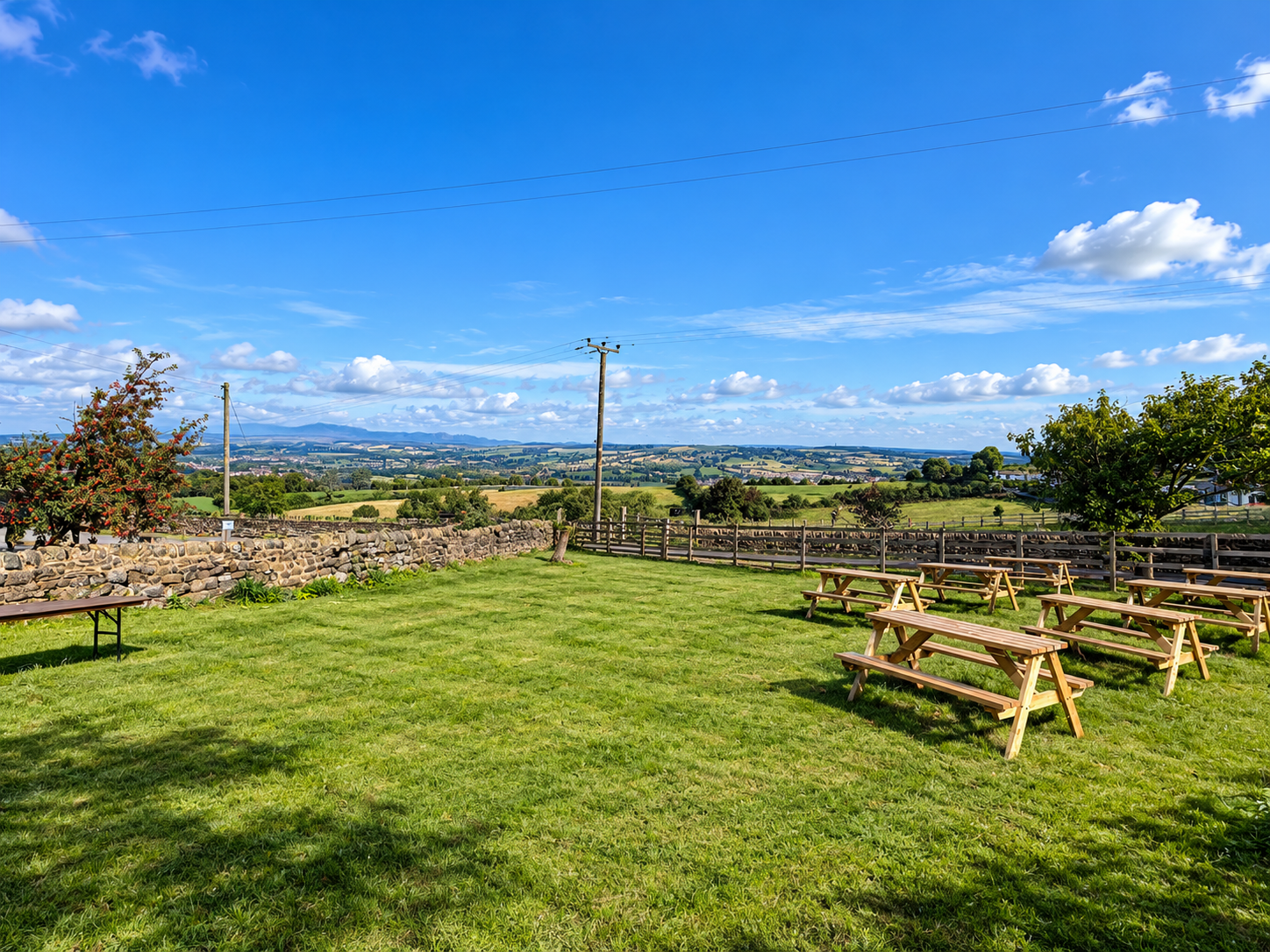 Beer garden picnic tables overlooking Wharfedale from The Chevin Inn